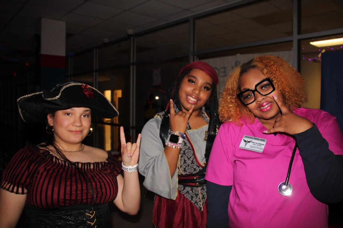 Too cute to spook! Juniors Aiyana Towler, Saniah Lyons and Aniya Watson Halloween vibes are on point. 