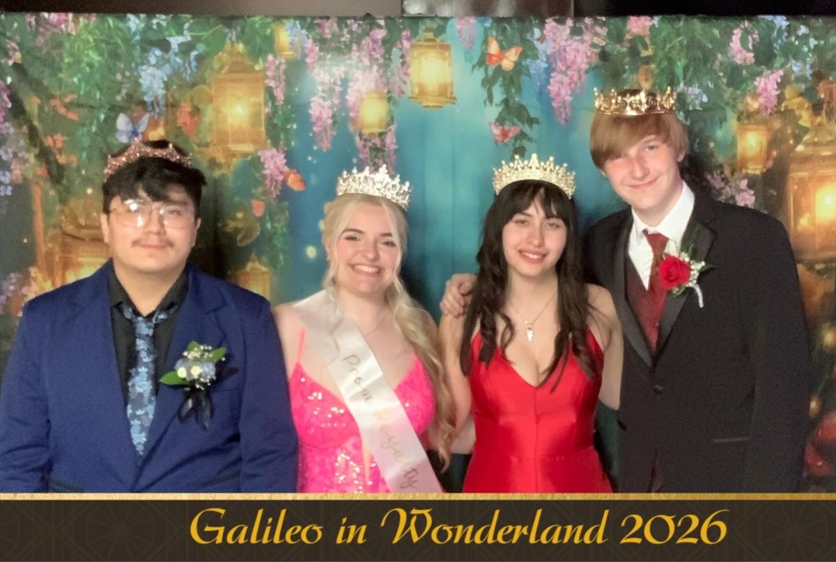 Senior David Gomez, Senior Piper Potts, Junior Samantha Van Opstal, and Junior Cole Gauldin posing together for a prom photoshoot