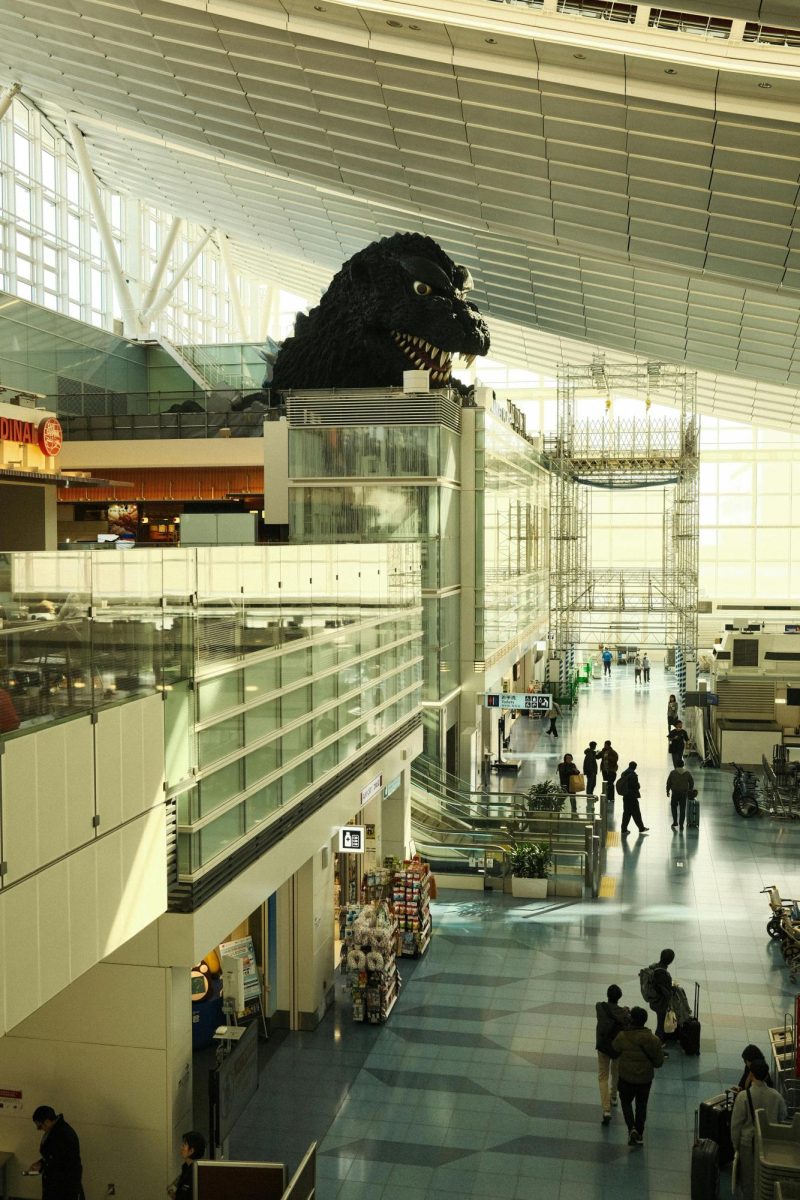 Godzilla Installation in Modern Airport Terminal